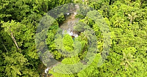 Aerial Drone flying over Cambugahay Falls in Siquijor.