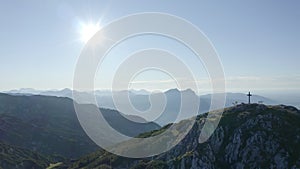 Aerial Drone Flying Past Summit Cross on mountain Untersberg, Austrian Alps