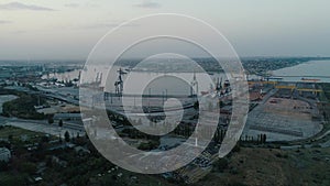Aerial drone footage. Fly to the Container Port of Ukraine at evening