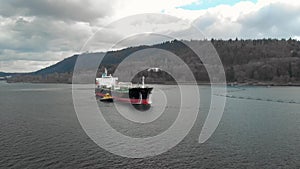 Aerial drone footage of an oil tanker and the expansion of the Kinder Morgan pipeline port facility Vancouver, BC, Canada. 4K 24FP