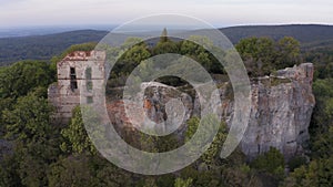 Aerial drone footage of the old Pajstun Castle ruins in autumn, Slovakia