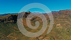 aerial drone image of beautiful stunning landscape view off the Degollada de La Yegua viewpoint with cliff rock peaks and valley photo