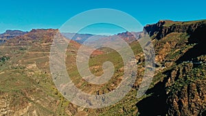 aerial drone image of beautiful stunning landscape view off the Degollada de La Yegua viewpoint with cliff rock peaks and valley photo