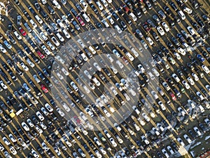 Aerial drone image of many cars parked on parking lot, top view