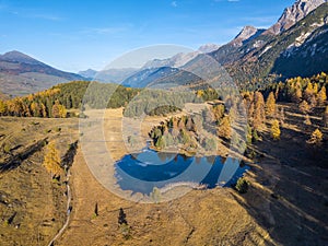 Aerial drone image of the mountain lake Lai Nair on the hiking area of Tarasp, photo