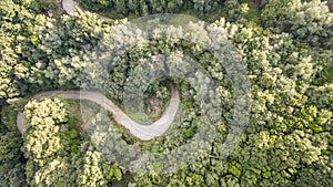 Aerial drone image of a twisty road in Corfu Greece.