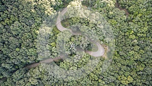 Aerial drone image of a twisty road in Corfu Greece.