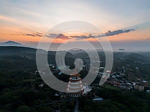 Aerial drone landscape photo of Wuji Tianyuan Temple in Tamsui, New Taipei City, Taiwan with beautiful sunset