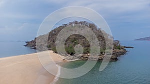 Aerial drone panorama of the beach at island of Taboga, popular getaway spot close to Panama city. Visible sand, water and some