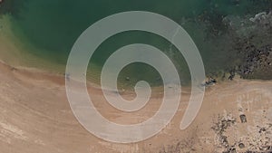 Aerial drone panorama of the beach at island of Taboga, popular getaway spot close to Panama city. Visible sand, water and some