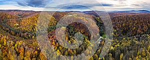 Aerial drone panorama of Carpathian mountain in Bratislava. View over beautiful autumn forest landscape. Colourful trees in the