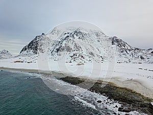 Aerial drone panoramic view of amazing Lofoten Islands. Top view picture at sunset. Winter scenery with famous nordic landscape in