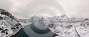 Aerial drone panoramic view of amazing Lofoten Islands winter scenery with famous Reine fishing village Norway, Scandinavia. Top v