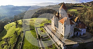 Aerial drone panoramic view of beauiful medieval castle Chateau de Montrottier, Rhone-Alpes, France