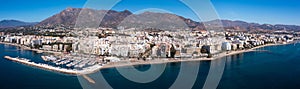 Aerial drone perspective of beautiful over luxury Puerto Banus Bay in Marbella. Spain