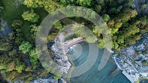 Aerial drone photo of beautiful island bay with blue clear water and boat photo