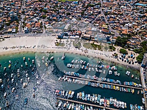 Aerial drone photo of fishing boats in the blue water. Brazilian city Arraial do Cabo and beach Praia dos Anjos photo
