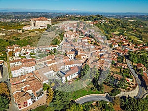 Aerial drone photo of Guarene castle and city in Northern Italy, langhe and roero region