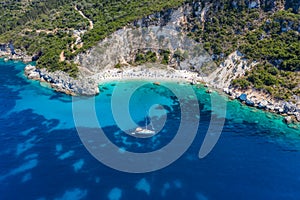 Aerial drone photo of iconic paradise sandy beach of Agiofili near port of Vasiliki with emerald crystal clear sea and