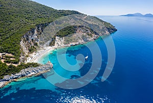 Aerial drone photo of iconic paradise sandy beach of Agiofili near port of Vasiliki with emerald crystal clear sea and