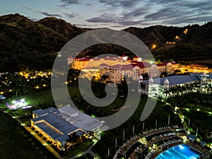 Aerial Drone Photo - Resort hotels along the Pacific coast of Costa Rica, surrounded by rugged mountains