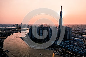 Aerial drone photo - Skyline of Saigon Ho Chi Minh City at sunset. Vietnam