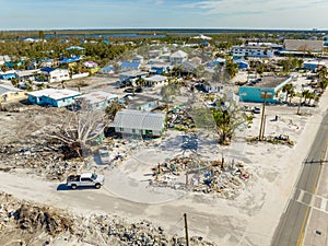 Aerial drone photo streets full of debris from Hurricane Ian aftermath