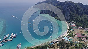 Aerial drone photo of Tonsai pier and iconic tropical beach and resorts of Phi Phi island photo