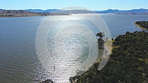 The aerial drone point of view footage at Bowna Waters Reserve is natural parkland on the foreshore.