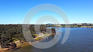 The aerial drone point of view footage at Bowna Waters Reserve is natural parkland on the foreshore.