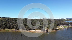 The aerial drone point of view footage at Bowna Waters Reserve is natural parkland on the foreshore.