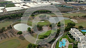 Aerial drone point of view Lo Romero golf club with modern villas