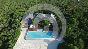 Aerial drone of a private resort with a large pool