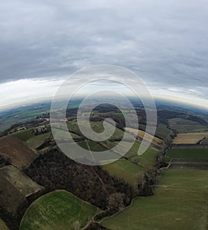 aerial drone scenic of hills, vineyards and farms in Martani near Castell'Arquato in Arda Valley, Italy.