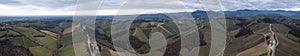 aerial drone scenic of hills, vineyards and farms in Martani near Castell'Arquato in Arda Valley, Italy.