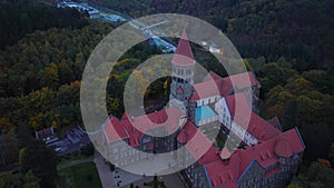 Aerial drone Shot of Abbey in Clervaux, Luxembourg in mystery evening twilight