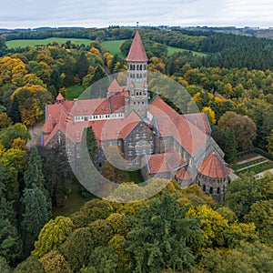 Aerial drone Shot of Abbey in Clervaux, Luxembourg in mystery evening twilight