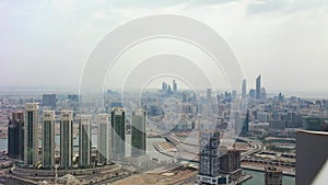 Aerial drone shot of Abu Dhabi city skyline and famous skyscrapers