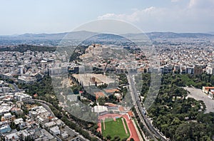 Aerial drone shot of Acropolis of Athens and Filopappou Hill, Zeus Olympion Temple and Zappeion