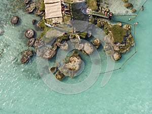 Aerial Drone Shot of Ancient Stromatolites in seven colores lagoon near Bacalar, Quintana Roo, Mexico