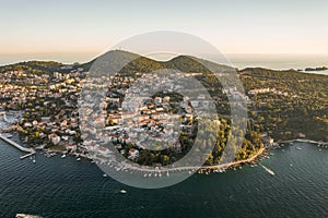 Aerial drone shot of Babin Kuk residential hill area in Dubrovnik in Adriatic sea in Croatia summer sunset