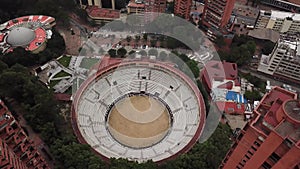 Aerial drone shot of Bogota downtown with Santamaria Bullring