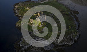 Aerial drone shot of Castle Tioram, it is a ruined castle that sits on the tidal island Eilean Tioram in Loch Moidart, Lochaber,