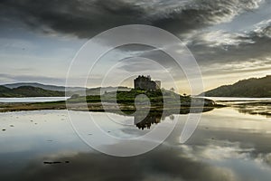 Aerial drone shot of Castle Tioram, it is a ruined castle that sits on the tidal island Eilean Tioram in Loch Moidart, Lochaber,