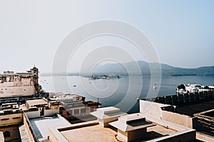 Aerial drone shot of the cityscape of Udaipur with the City Palace, Mewar, India photo