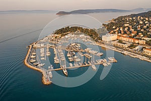 Aerial drone shot of Diocletian Palace by port riva in Split old town before sunrise in early morning in Croatia