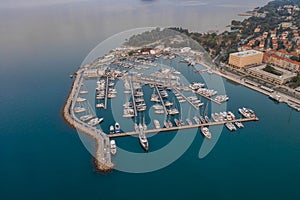 Aerial drone shot of Diocletian Palace by port riva in Split old town before sunrise in early morning in Croatia