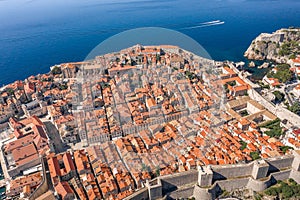 Aerial drone shot of Dubrovink city old town with view of fort in Croatia summer morning