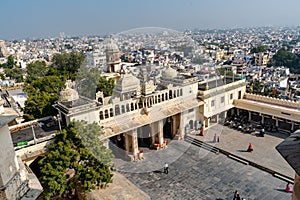 Aerial drone shot of the entrance of the City Palace in Udaipur, Mewar, India photo