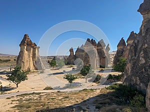 Aerial drone shot of the Fairy Chimneys over the landscape of Goreme, Cappadocia.